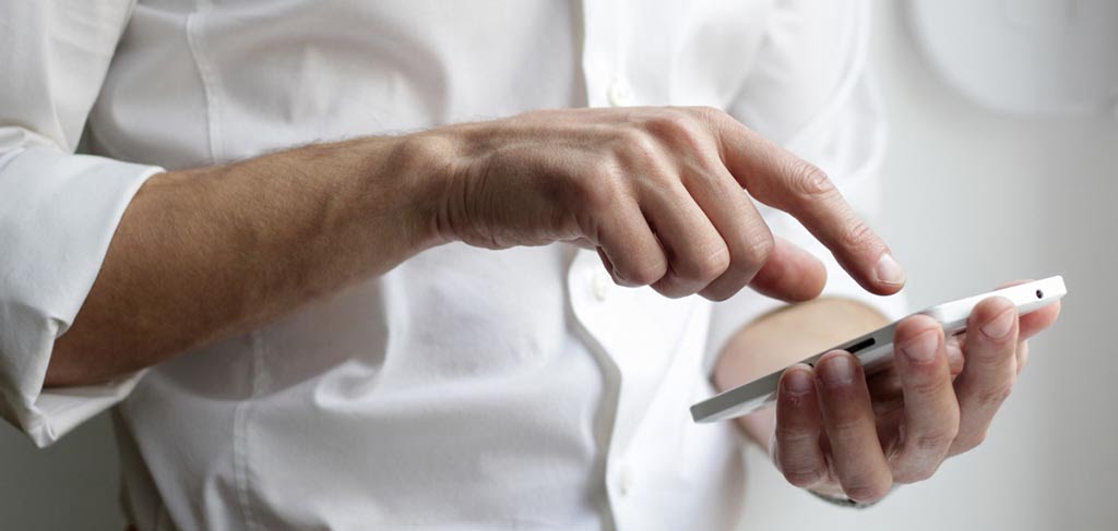 Person scrolling on a smartphone