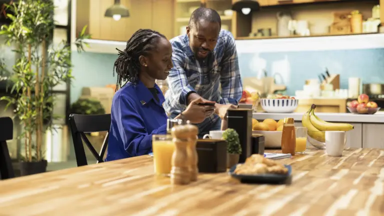 Customer and shop owner at a café counter, representing a small online business